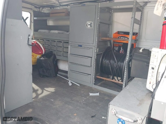 2009 Ford Econoline Cargo Van with VIN 1FTNE24L09DA20522, listed as a IAAI auction lot 41864575 with 131,216 mi miles. Bid and sale history available at carsss.com. Image 8.