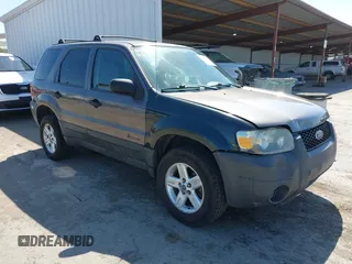 2005 Ford Escape Hybrid with VIN 1FMYU96H95KC95213, listed as a IAAI auction lot 42180424 with 257,773 mi miles and . Bid and sale history available at DreamBid. Image 1.