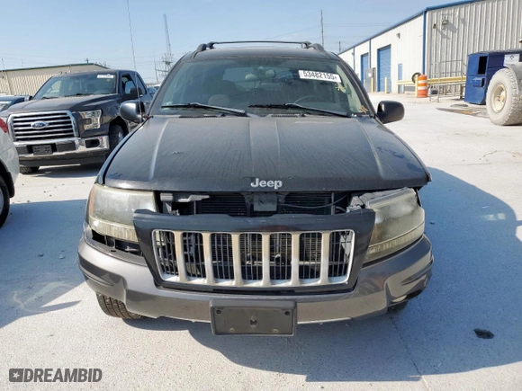 2004 Jeep Grand Cherokee Laredo with VIN 1J4GX48S24C303786, listed as a Copart auction lot 53482155 with 167,823 mi miles and Salvage Title. Bid and sale history available at carsss.com. Image 5.