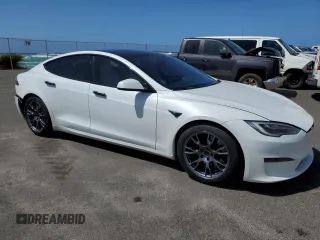 2021 Tesla Model S Plaid с VIN 5YJSA1E66MF453717, выставлен на аукционе Copart как лот 49330355 с пробегом 64 458 миль миль и Списание • Salvage title. История ставок и продаж доступна на DreamBid. Изображение 4.