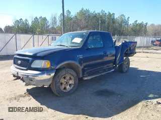 2003 Ford F-150 XL with VIN 1FTRX18L73NB36799, listed as a IAAI auction lot 41317602 with 270,075 mi miles. Bid and sale history available at carsss.com. Image 2.