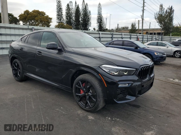 2021 BMW X6 xDrive40i with VIN 5UXCY6C00M9E08487, listed as a Copart auction lot 46477895 with 34,000 mi miles and Salvage Title. Bid and sale history available at carsss.com. Image 4.