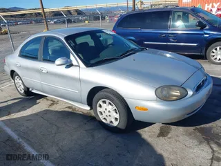 1999 Mercury Sable GS with VIN 1MEFM50U1XA612306, listed as a IAAI auction lot 41745776 with 111,311 mi miles. Bid and sale history available at carsss.com. Image 1.