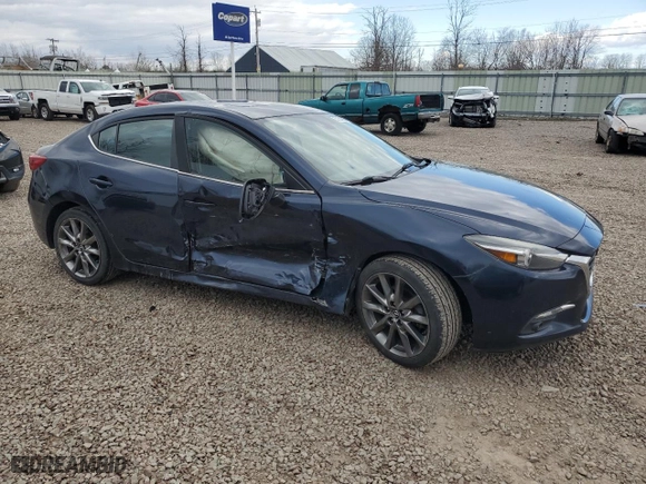 2018 Mazda Mazda3 4-Door Grand Touring with VIN 3MZBN1W38JM190398, listed as a Copart auction lot 53164605 with 74,845 mi miles and Salvage Title. Bid and sale history available at carsss.com. Image 4.