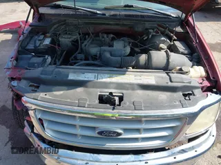 1999 Ford F-150 with VIN 1FTZX1725XKA41044, listed as a IAAI auction lot 42446146 with Not provided miles and . Bid and sale history available at DreamBid. Image 10.