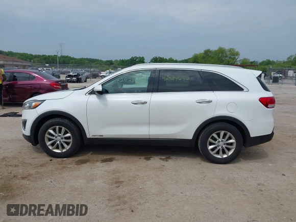 2017 Kia Sorento LX with VIN 5XYPGDA57HG216333, listed as a IAAI auction lot 42524652 with 214,700 mi miles and . Bid and sale history available at DreamBid. Image 14.
