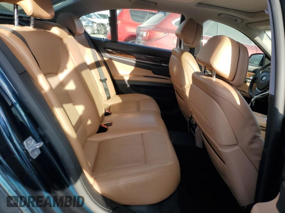 2013 BMW 7 Series 750i xDrive with VIN WBAYB6C50DD223786, listed as a Copart auction lot 87579345 with 143,523 mi miles and Salvage title. Bid and sale history available at DreamBid. Image 10.