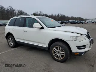 2008 Volkswagen Touareg V6 z VIN WVGBE77L08D043577, wystawiony jako Copart lot #50735775 z przebiegiem Nie podano mil oraz Szkoda całkowita • Salvage title. Historia ofert i sprzedaży dostępna na DreamBid. Obrazek 4.