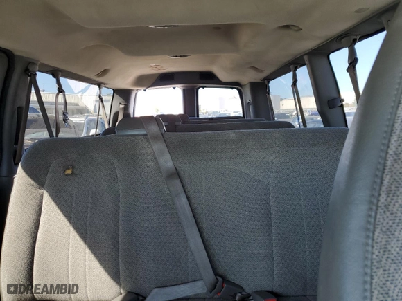 2012 Chevrolet Express Passenger 1LT with VIN 1GAZG1FG4C1100252, listed as a Copart auction lot 73242444 with 76,779 mi miles and Salvage Title. Bid and sale history available at carsss.com. Image 10.