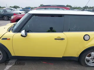 2005 MINI Hardtop with VIN WMWRC33505TK62367, listed as a IAAI auction lot 42397651 with Not provided miles and . Bid and sale history available at DreamBid. Image 14.