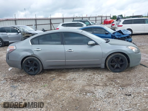 2008 Nissan Altima SE z VIN 1N4BL21E58C210986, wystawiony jako IAAI lot #42322119 z przebiegiem 154 546 mil mil oraz . Historia ofert i sprzedaży dostępna na DreamBid. Obrazek 13.