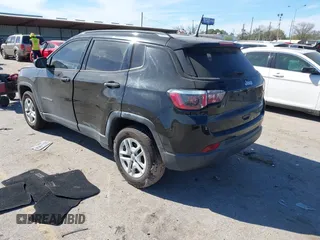 2018 Jeep Compass Sport with VIN 3C4NJCABXJT214907, listed as a IAAI auction lot 41814215 with 96,111 mi miles and . Bid and sale history available at DreamBid. Image 3.