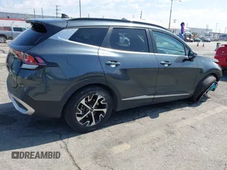2023 Kia Sportage EX with VIN KNDPVCAG4P7014112, listed as a IAAI auction lot 42610022 with 50,680 mi miles and . Bid and sale history available at DreamBid. Image 4.