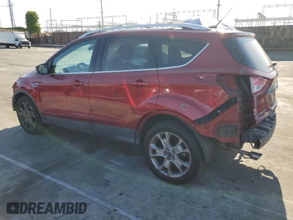 2015 Ford Escape Titanium with VIN 1FMCU9J99FUC82817, listed as a Copart auction lot 52206505 with 129,840 mi miles and Salvage Title. Bid and sale history available at carsss.com. Image 2.