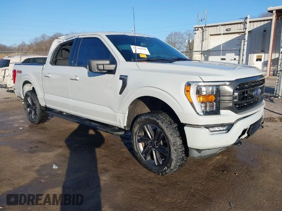 2023 Ford F-150 XL with VIN 1FTFW1E58PFB33406, listed as a IAAI auction lot 41768342 with 42,054 mi miles. Bid and sale history available at carsss.com. Image 1.