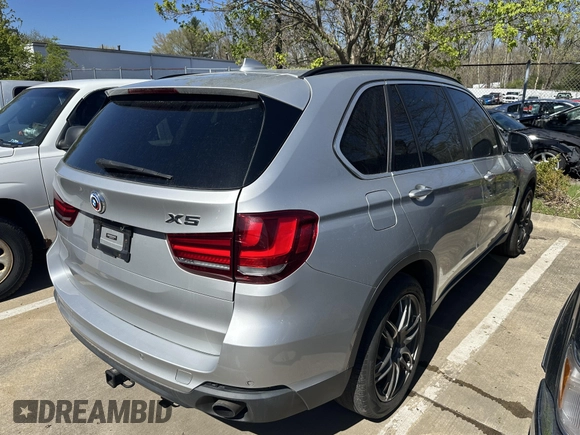 2015 BMW X5 xDrive35i with VIN 5UXKR0C57F0P14432, listed as a IAAI auction lot 42076389 with 119,109 mi miles. Bid and sale history available at carsss.com. Image 4.