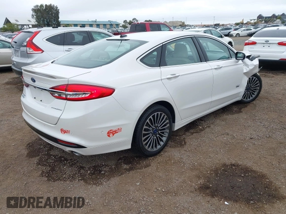 2017 Ford Fusion Titanium with VIN 3FA6P0SU2HR379834, listed as a IAAI auction lot 42440382 with 55,646 mi miles and . Bid and sale history available at DreamBid. Image 4.