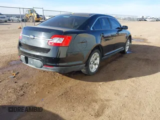 2011 Ford Taurus SEL with VIN 1FAHP2EW1BG177504, listed as a IAAI auction lot 41578564 with 243,855 mi miles. Bid and sale history available at carsss.com. Image 4.