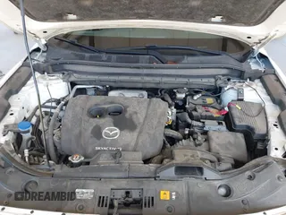 2020 Mazda CX-5 Grand Touring with VIN JM3KFBDM2L0863944, listed as a IAAI auction lot 42150805 with 63,932 mi miles and . Bid and sale history available at DreamBid. Image 10.