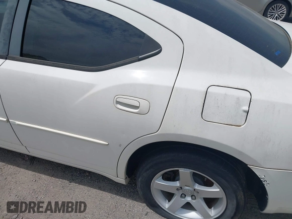 2010 Dodge Charger SXT with VIN 2B3CA3CV0AH165824, listed as a IAAI auction lot 42071499 with 203,013 mi miles. Bid and sale history available at carsss.com. Image 6.