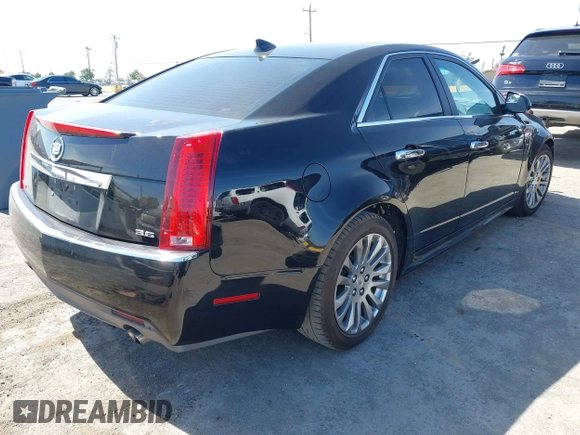 2012 Cadillac CTS Performance z VIN 1G6DJ5E30C0156576, wystawiony jako IAAI lot #42287858 z przebiegiem 106 497 mil mil oraz . Historia ofert i sprzedaży dostępna na DreamBid. Obrazek 4.
