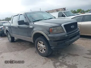 2005 Ford F-150 XLT with VIN 1FTPW12555FB01406, listed as a IAAI auction lot 41917408 with 213,437 mi miles. Bid and sale history available at carsss.com. Image 1.