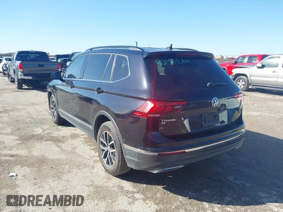 2020 Volkswagen Tiguan SE with VIN 3VV3B7AX0LM106561, listed as a IAAI auction lot 41712689 with 85,374 mi miles and . Bid and sale history available at DreamBid. Image 3.