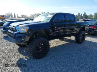 2015 Toyota Tacoma with VIN 3TMLU4EN1FM167938, listed as a IAAI auction lot 42349196 with 150,865 mi miles and . Bid and sale history available at DreamBid. Image 2.