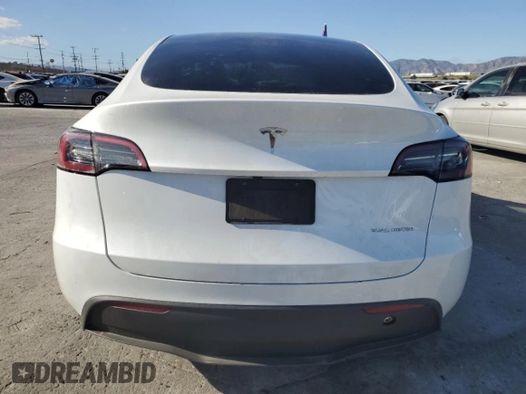 2024 Tesla Model Y Long Range with VIN 7SAYGDEE6RA261884, listed as a Copart auction lot 47639025 with 23,377 mi miles and Salvage Title. Bid and sale history available at DreamBid. Image 6.