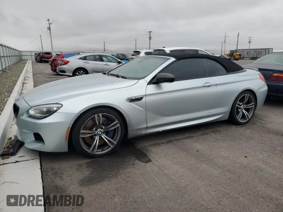2014 BMW M6 z VIN WBSLZ9C56EDZ78719, wystawiony jako Copart lot #42445545 z przebiegiem 63 691 mil mil oraz Szkoda całkowita • Salvage title. Historia ofert i sprzedaży dostępna na DreamBid. Obrazek 1.