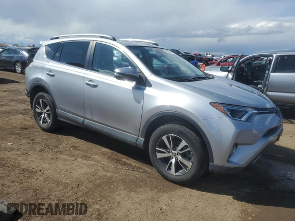 2018 Toyota RAV4 XLE with VIN 2T3RFREV2JW699448, listed as a Copart auction lot 55345975 with 46,437 mi miles and Salvage Title. Bid and sale history available at DreamBid. Image 4.