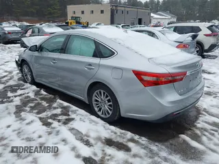 2016 Toyota Avalon XLE Premium z VIN 4T1BD1EB0GU049999, wystawiony jako IAAI lot #41624589 z przebiegiem 61 785 mil mil oraz . Historia ofert i sprzedaży dostępna na DreamBid. Obrazek 3.