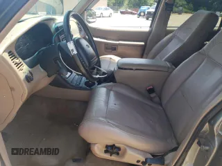 1999 Ford Explorer XLT z VIN 1FMZU32E4XUB76005, wystawiony jako Copart lot #65391564 z przebiegiem 245 873 mil mil oraz Szkoda całkowita • Salvage title. Historia ofert i sprzedaży dostępna na DreamBid. Obrazek 7.