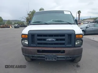 2012 Ford Econoline Cargo Commercial with VIN 1FTNE1EW6CDA42261, listed as a IAAI auction lot 41750879 with 249,408 mi miles and . Bid and sale history available at carsss.com. Image 12.