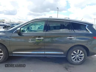 2013 Infiniti JX35 z VIN 5N1AL0MM0DC302090, wystawiony jako IAAI lot #41945285 z przebiegiem 198 767 mil mil oraz . Historia ofert i sprzedaży dostępna na DreamBid. Obrazek 6.