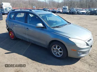 2010 Hyundai Elantra Touring SE with VIN KMHDC8AE0AU061050, listed as a IAAI auction lot 41761048 with 97,533 mi miles. Bid and sale history available at carsss.com. Image 1.