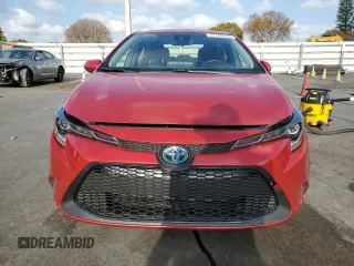 2021 Toyota Corolla Hybrid LE with VIN JTDEAMDE5MJ012662, listed as a Copart auction lot 52142455 with 138,564 mi miles and Clean Title. Bid and sale history available at carsss.com. Image 5.