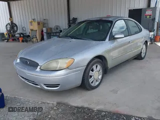 2005 Ford Taurus SEL with VIN 1FAFP56235A209879, listed as a IAAI auction lot 42537452 with 231,151 mi miles and . Bid and sale history available at DreamBid. Image 2.