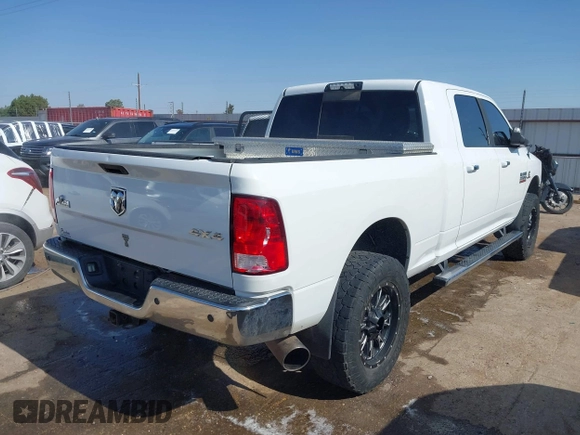 2015 Ram 2500 SLT with VIN 3C6UR5ML3FG674244, listed as a IAAI auction lot 42550144 with 220,481 mi miles and . Bid and sale history available at DreamBid. Image 4.