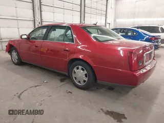 2005 Cadillac DeVille z VIN 1G6KD57Y85U107418, wystawiony jako IAAI lot #42352987 z przebiegiem 160 974 mil mil oraz . Historia ofert i sprzedaży dostępna na DreamBid. Obrazek 3.