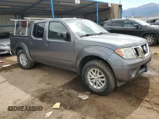 2016 Nissan Frontier Pro-4X with VIN 1N6AD0EV6GN789407, listed as a Copart auction lot 60427635 with 89,909 mi miles and Salvage title. Bid and sale history available at DreamBid. Image 4.