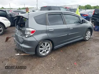 2011 Honda Fit Sport z VIN JHMGE8H51BC003715, wystawiony jako IAAI lot #42108476 z przebiegiem 174 228 mil mil oraz . Historia ofert i sprzedaży dostępna na DreamBid. Obrazek 4.