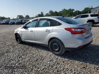 2013 Ford Focus SE with VIN 1FADP3F20DL142026, listed as a Copart auction lot 61855025 with 148,851 mi miles and Salvage title. Bid and sale history available at DreamBid. Image 2.