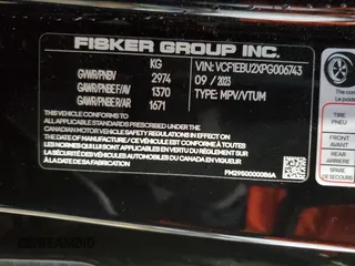 2023 Fisker Ocean Extreme z VIN VCF1EBU2XPG006743, wystawiony jako Copart lot #41668795 z przebiegiem Nie podano mil oraz Szkoda całkowita • Salvage title. Historia ofert i sprzedaży dostępna na DreamBid. Obrazek 14.
