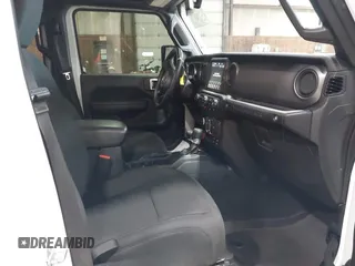 2023 Jeep Wrangler Sport S with VIN 1C4HJXDN2PW632584, listed as a IAAI auction lot 41965191 with 20,288 mi miles and . Bid and sale history available at DreamBid. Image 5.