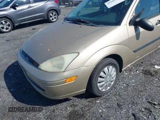 2002 Ford Focus LX with VIN 1FAFP33P42W289681, listed as a IAAI auction lot 41989506 with 128,070 mi miles and . Bid and sale history available at DreamBid. Image 6.