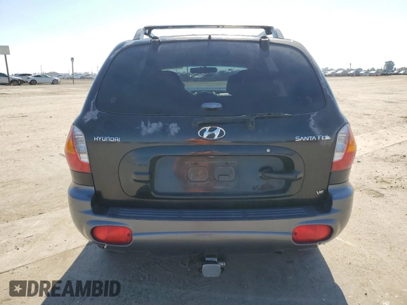 2001 Hyundai Santa Fe GLS with VIN KM8SC83D71U123474, listed as a Copart auction lot 50665145 with 84,155 mi miles and Salvage Title. Bid and sale history available at carsss.com. Image 6.