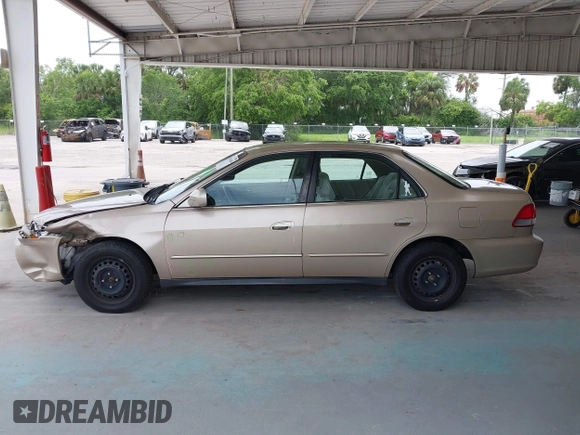2002 Honda Accord LX z VIN 1HGCG56452A135666, wystawiony jako IAAI lot #42436949 z przebiegiem 103 652 mil mil oraz . Historia ofert i sprzedaży dostępna na DreamBid. Obrazek 14.