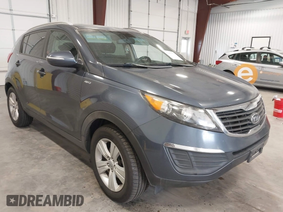 2011 Kia Sportage LX z VIN KNDPBCA21B7152695, wystawiony jako IAAI lot #41877774 z przebiegiem 306 540 mil mil oraz . Historia ofert i sprzedaży dostępna na DreamBid. Obrazek 1.