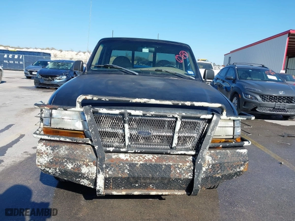 1998 Ford Ranger XL with VIN 1FTYR10C1WPB40423, listed as a IAAI auction lot 41621407 with 122,656 mi miles. Bid and sale history available at carsss.com. Image 12.